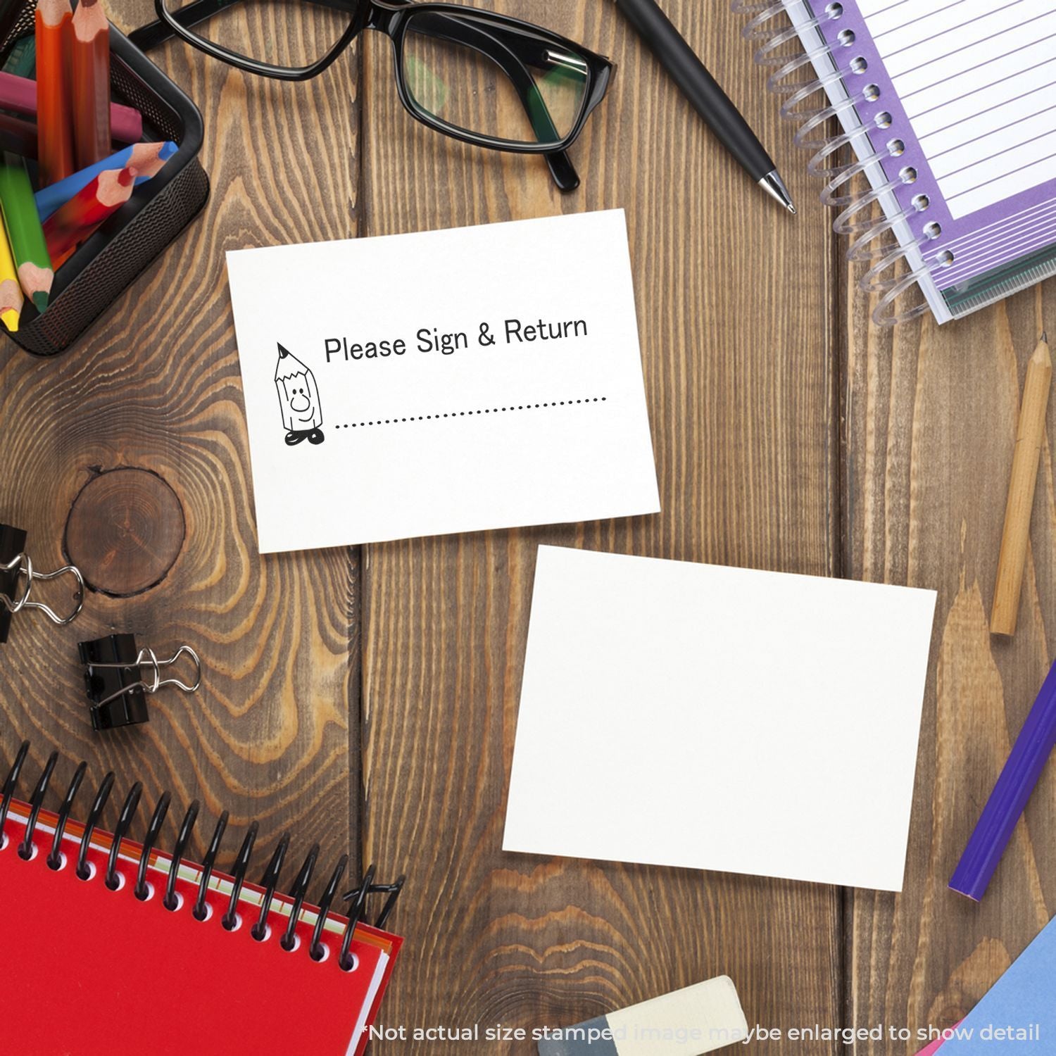 Desk document note reading Please Sign & Return with stationery, pens, and glassesoffice signature request return message form.