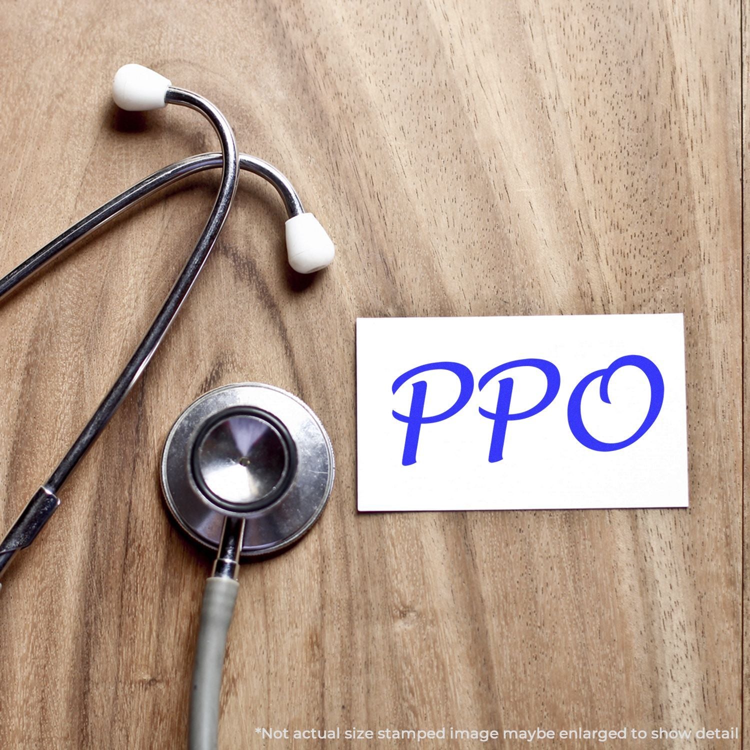 Stethoscope beside health insurance PPO logo card on wooden desk, showing medical coverage and managed care health plan concept.