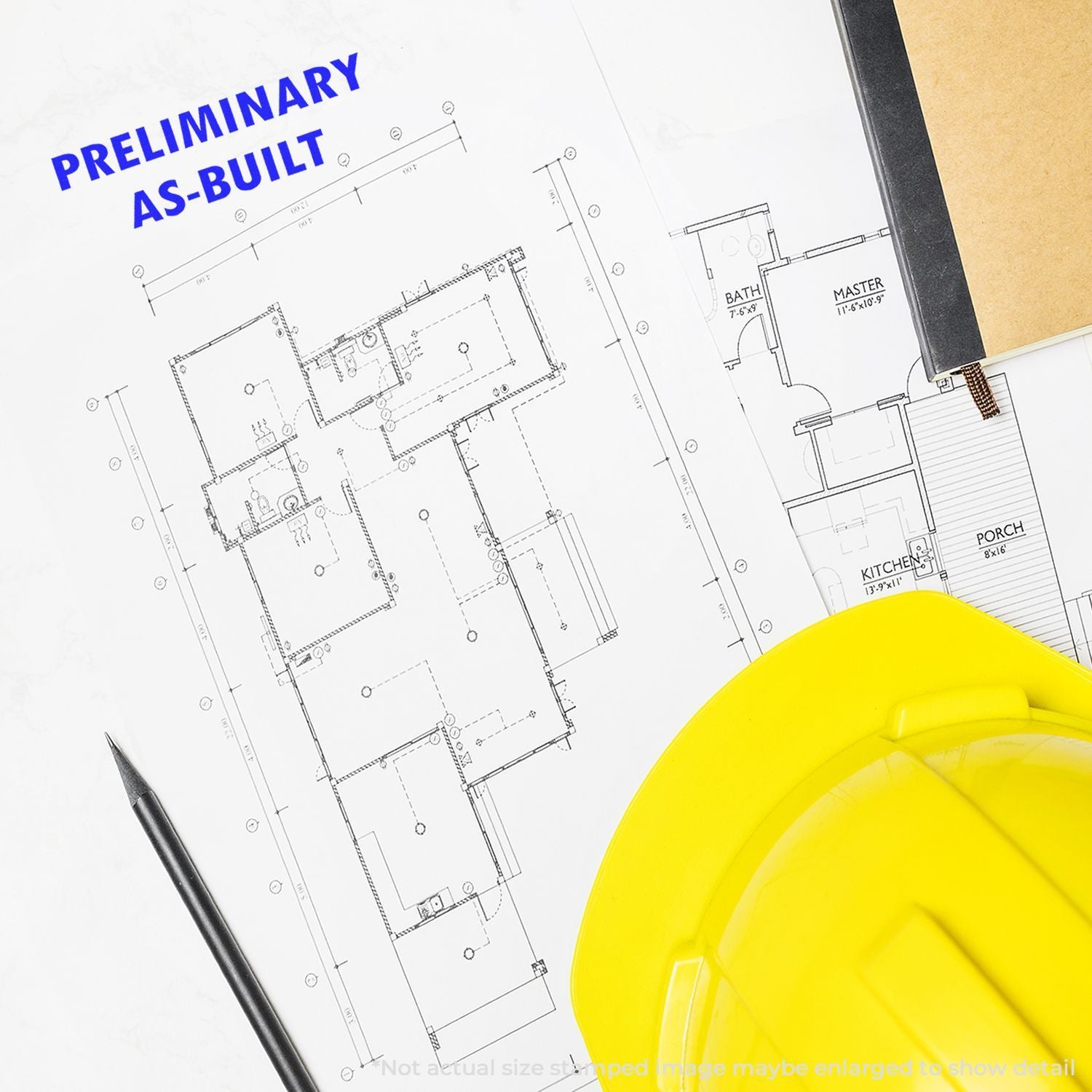 Preliminary as-built floor plan with room measurements, construction pen and yellow hard hatused for building inspection and verification.