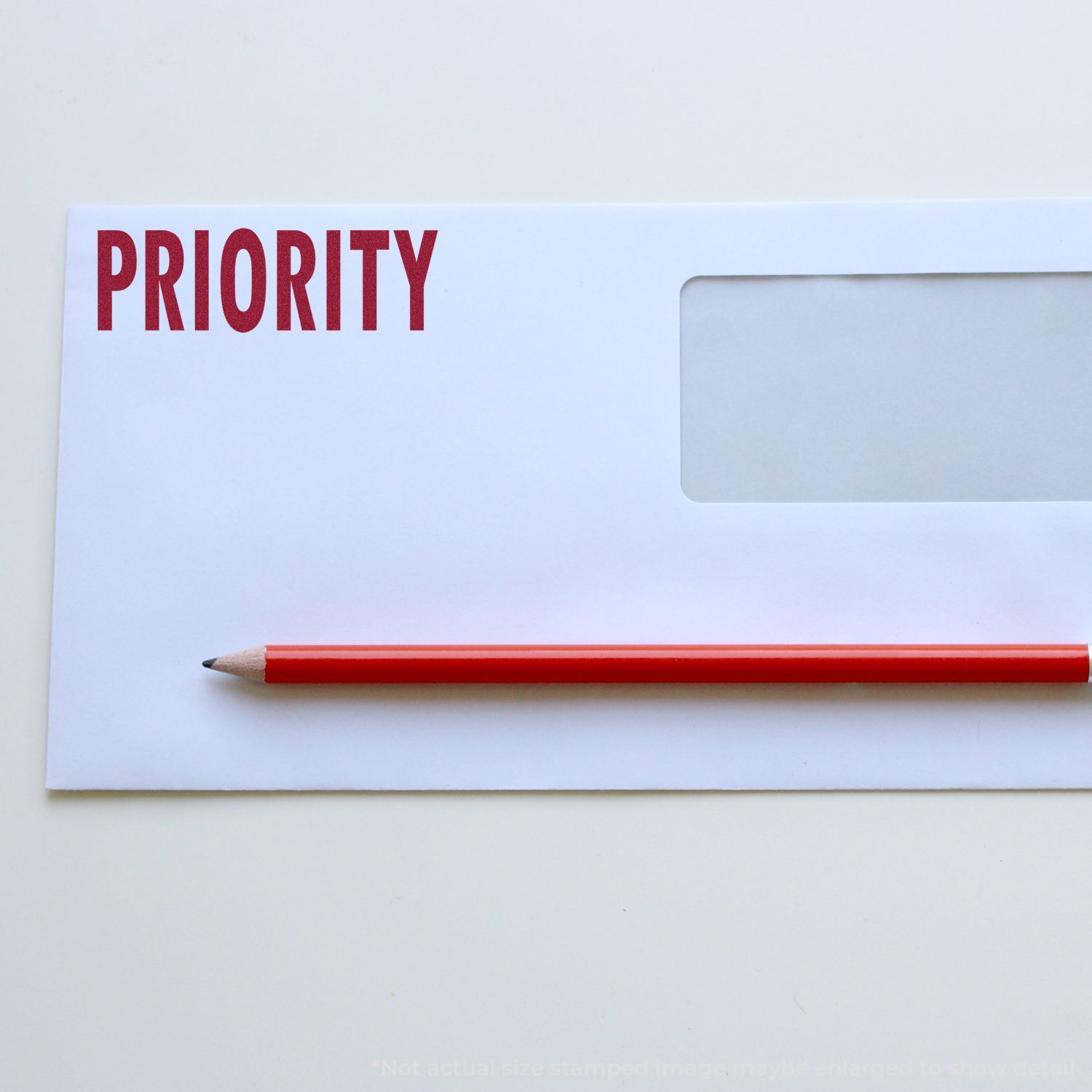 Priority planning concept: notebook page labeled PRIORITY with red pencil, symbolizing focused task management and productivity.
