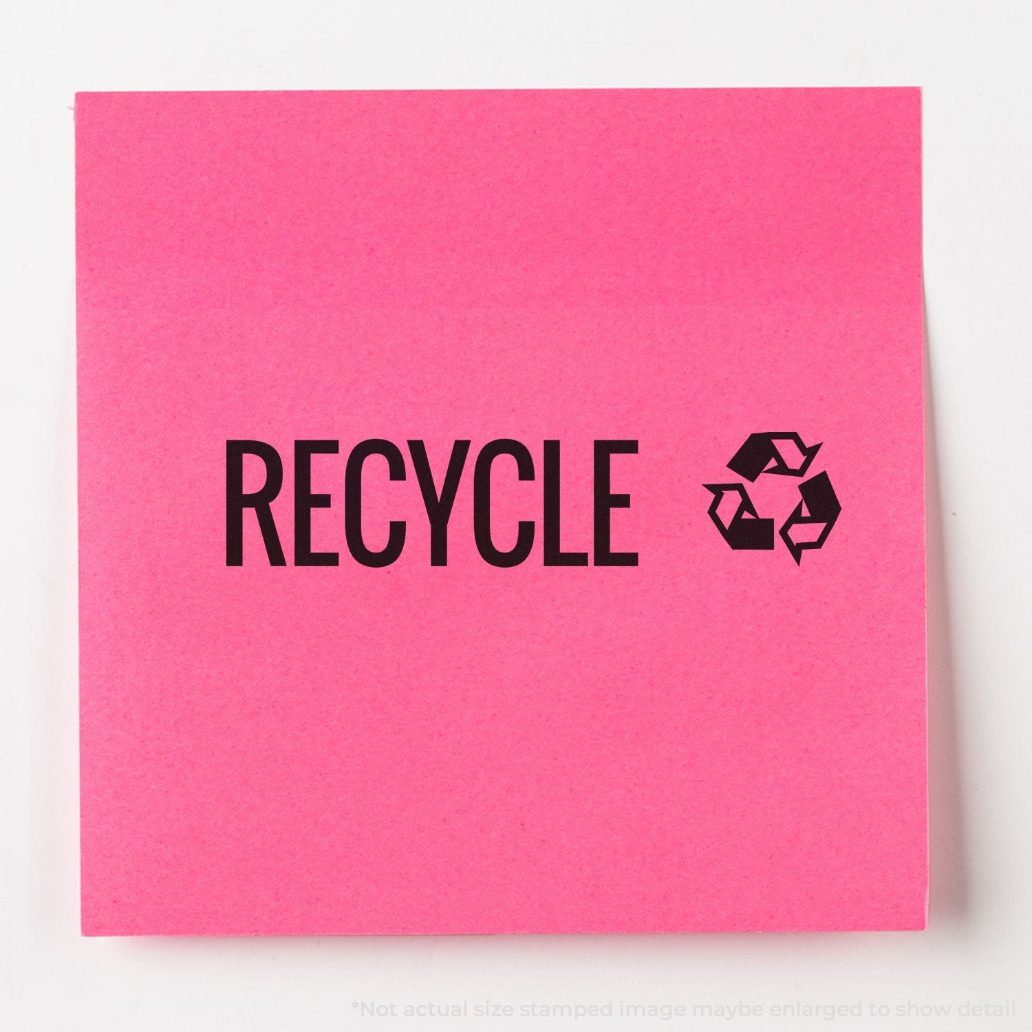 Pink recycling sign with bold RECYCLE text and recycling logo promoting eco-friendly waste reduction.