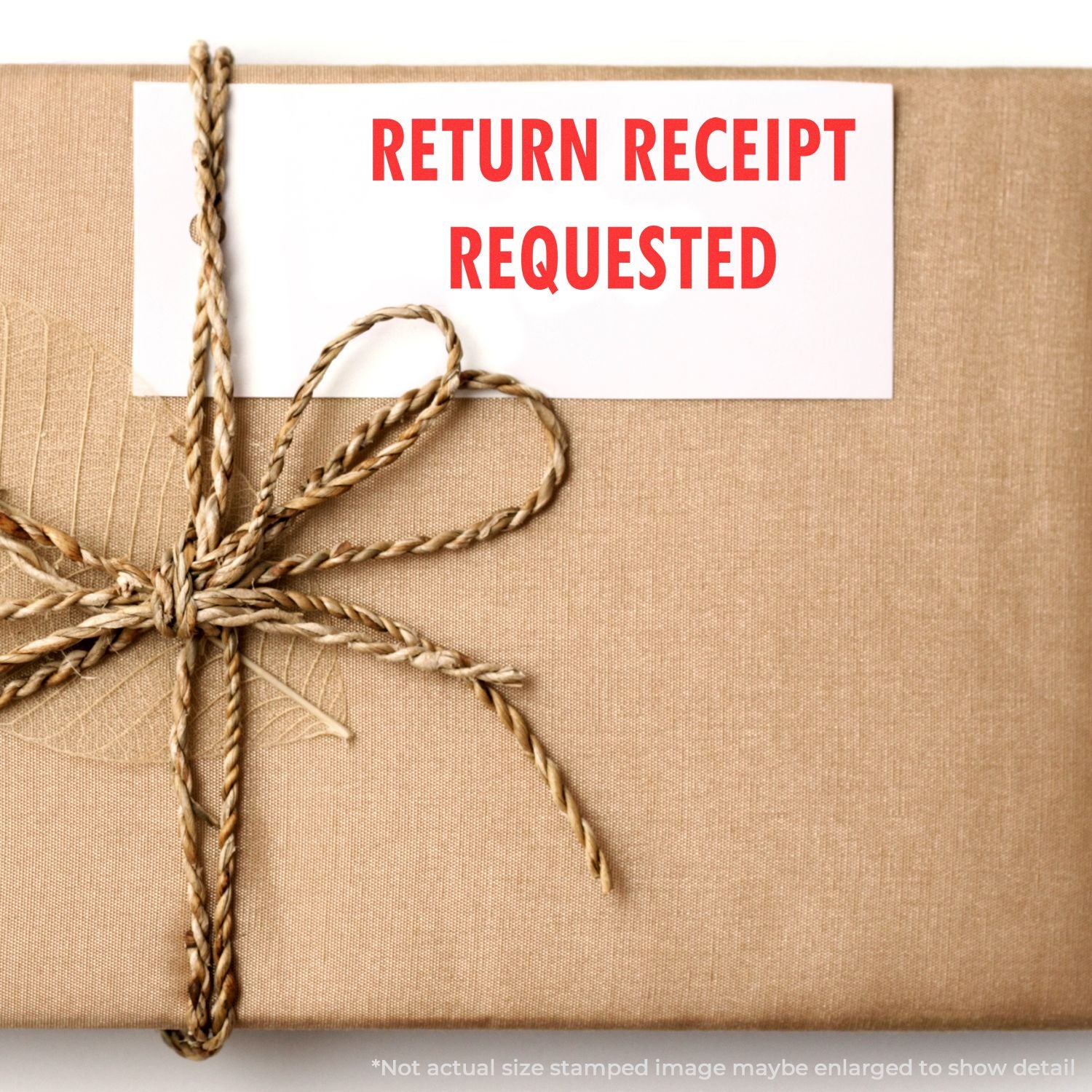 Brown paper gift package with twine bow and “Return Receipt Requested” red text label to send registered mail.