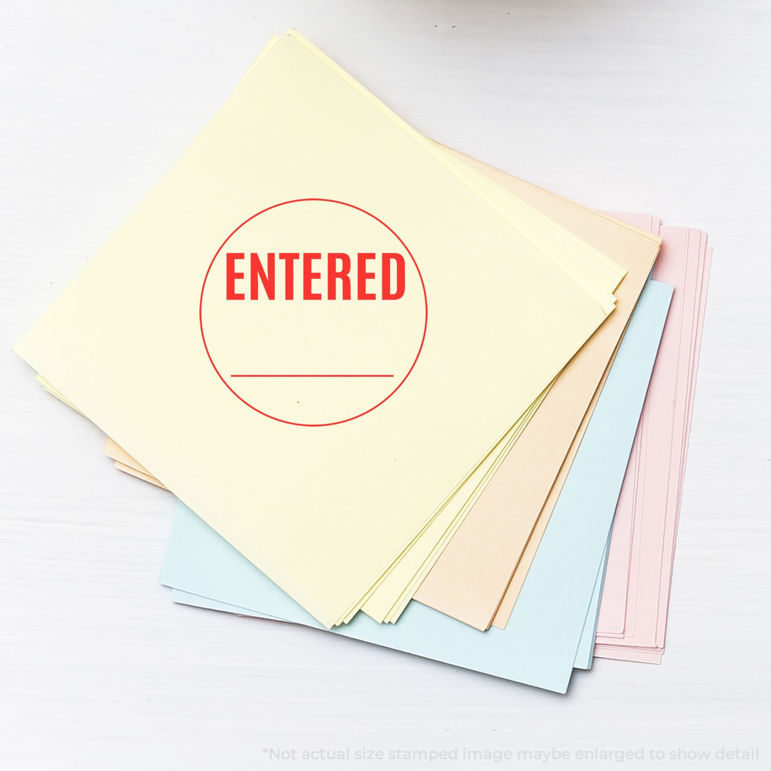 Pastel file folders with red ENTERED stamp, office document processing and records organization image