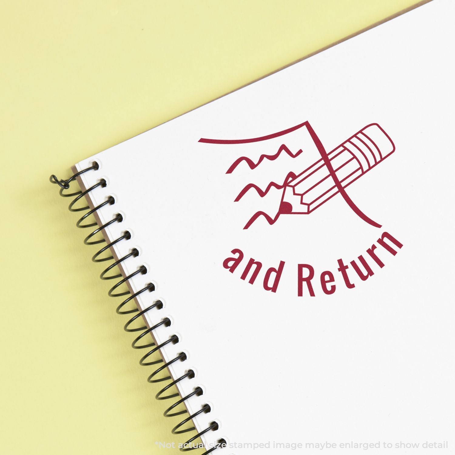 Spiral notebook with pencil icon and and Return text on a yellow background