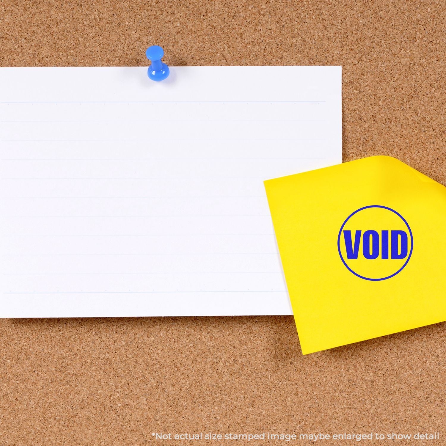 Blank white paper pinned to a corkboard with a yellow sticky note stamped VOID and a blue pushpin.