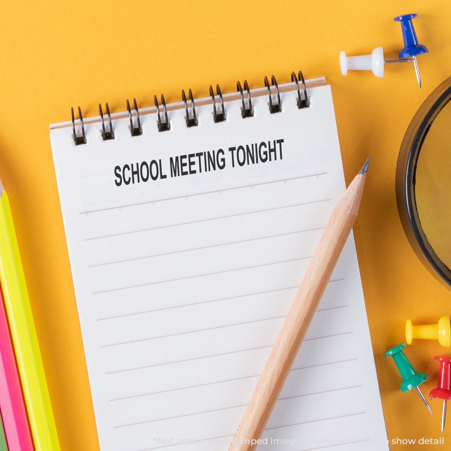 School meeting tonight reminder on notebook with pencil and pins, back-to-school planning for educators and parents classroom schedule