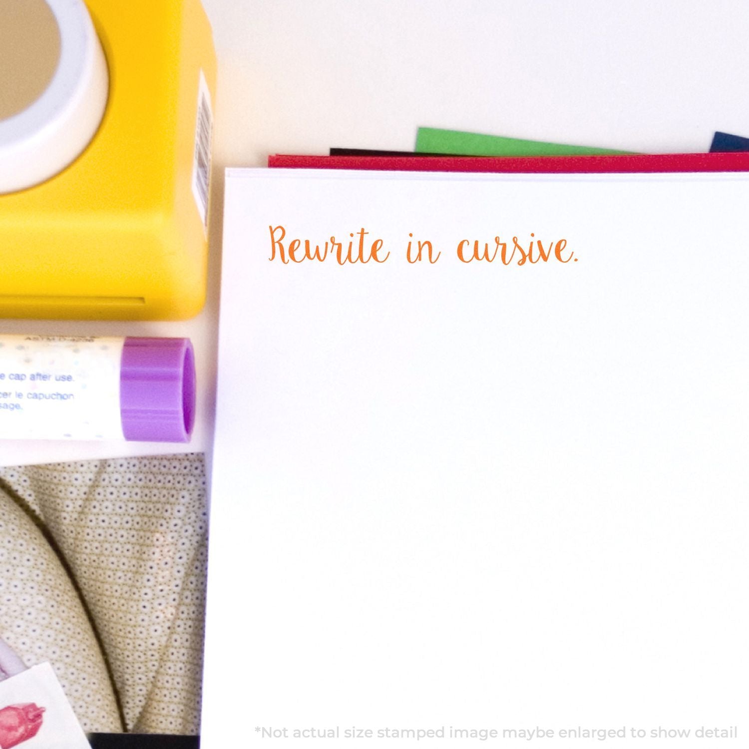 Cursive handwriting practice with notebooks showing prompt Rewrite in cursive for writing lessons.