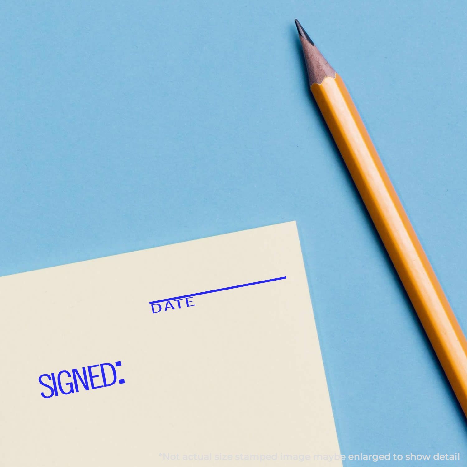 Pencil beside signed and dated document form on blue background