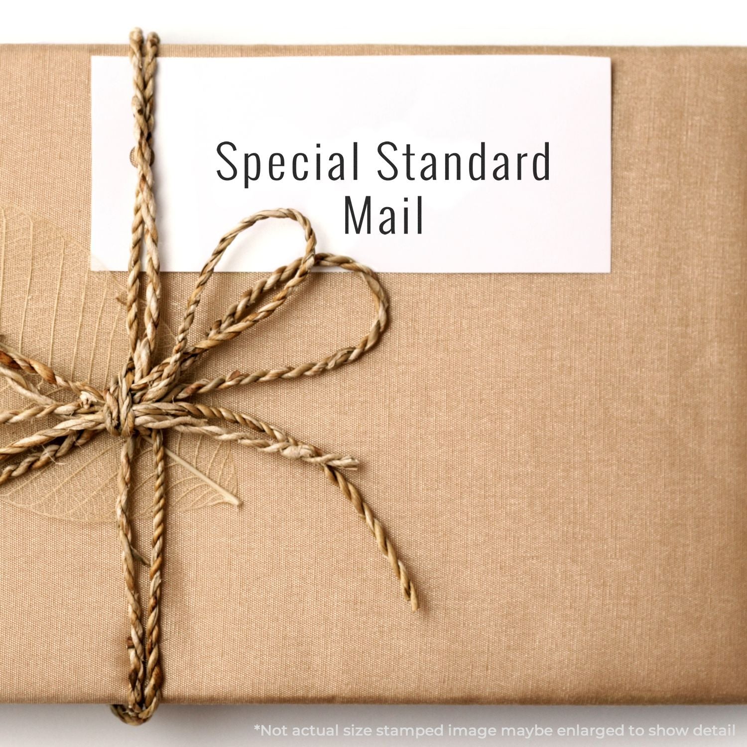 Special Standard Mail label on burlap package tied with twine, promoting shipping service and delivery options.