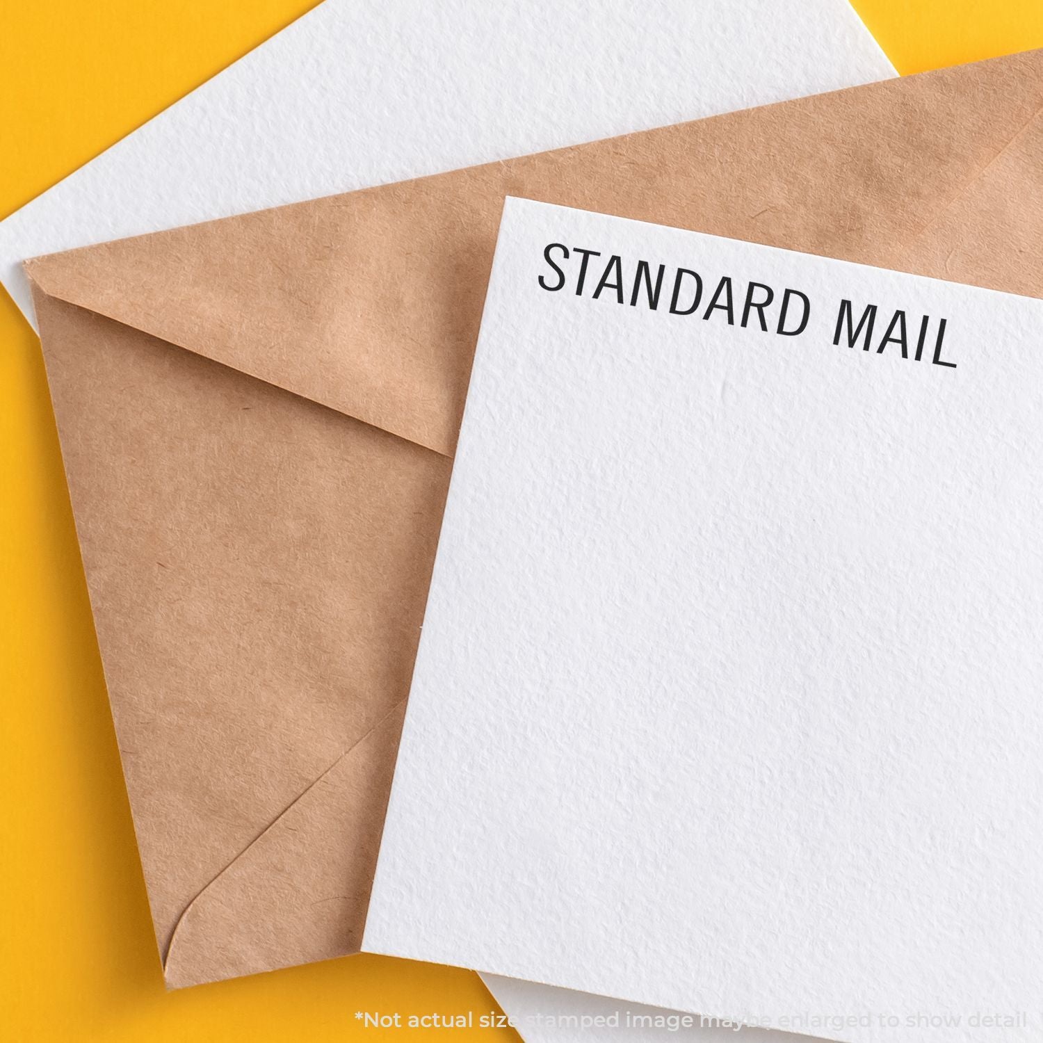 Brown envelope with STANDARD MAIL label on white paper, representing standard postal delivery and mailing services.