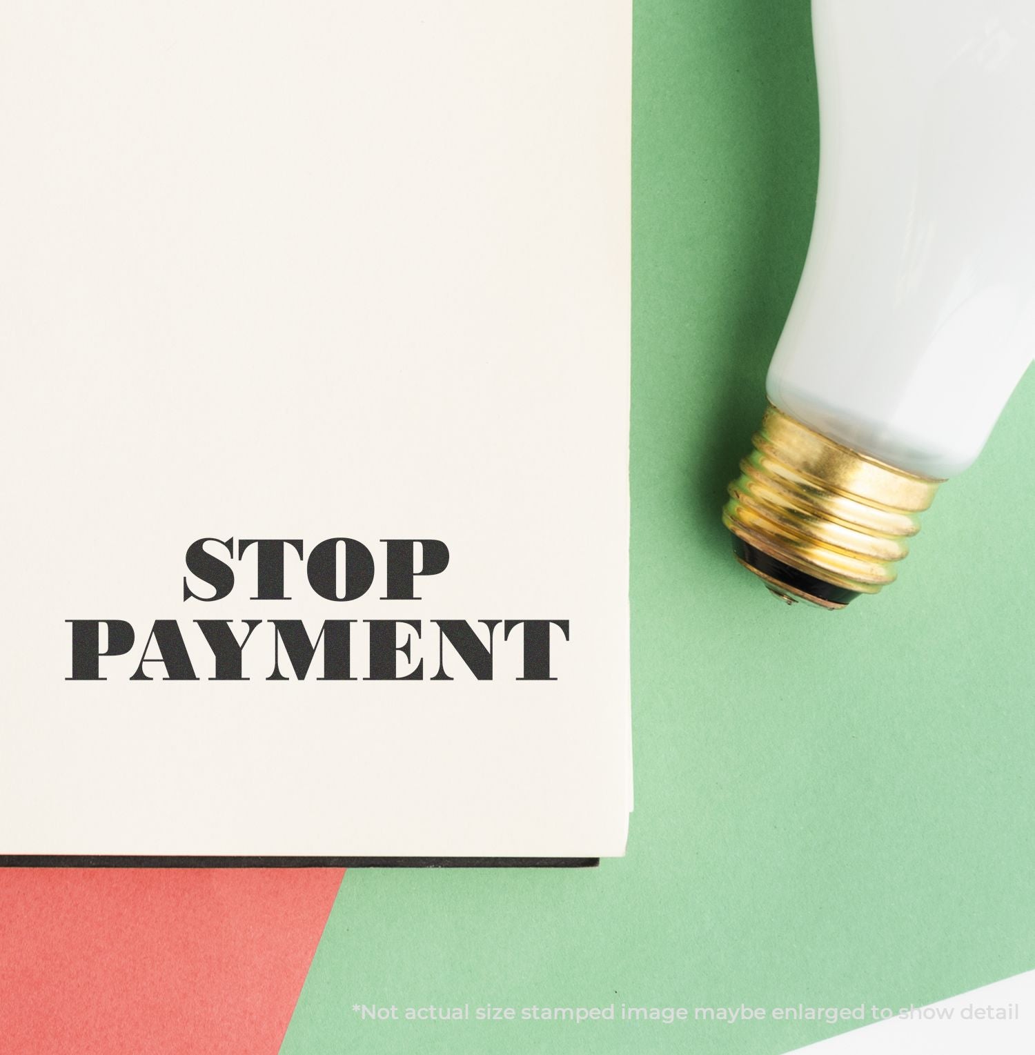 Stop payment text with a broken light bulb on pastel green and white background, concept of saving energy and reducing costs.