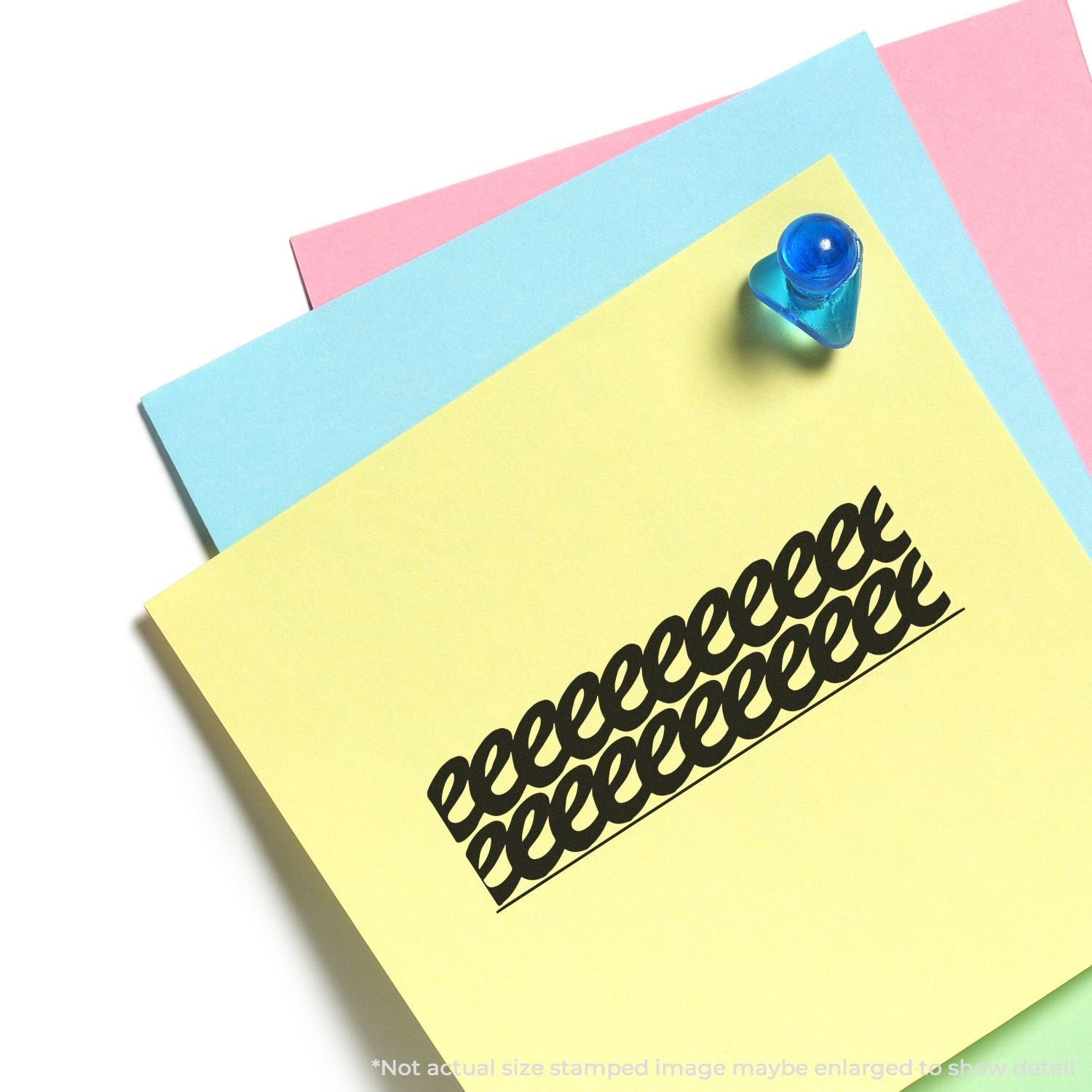 Pastel sticky notes with a blue rubber stamp on yellow paper, colorful office stationery close-up.