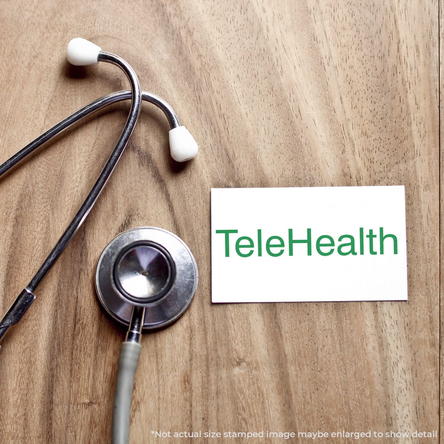 Stethoscope next to TeleHealth card on a wooden desk, symbolizing remote healthcare and online medical consultation.