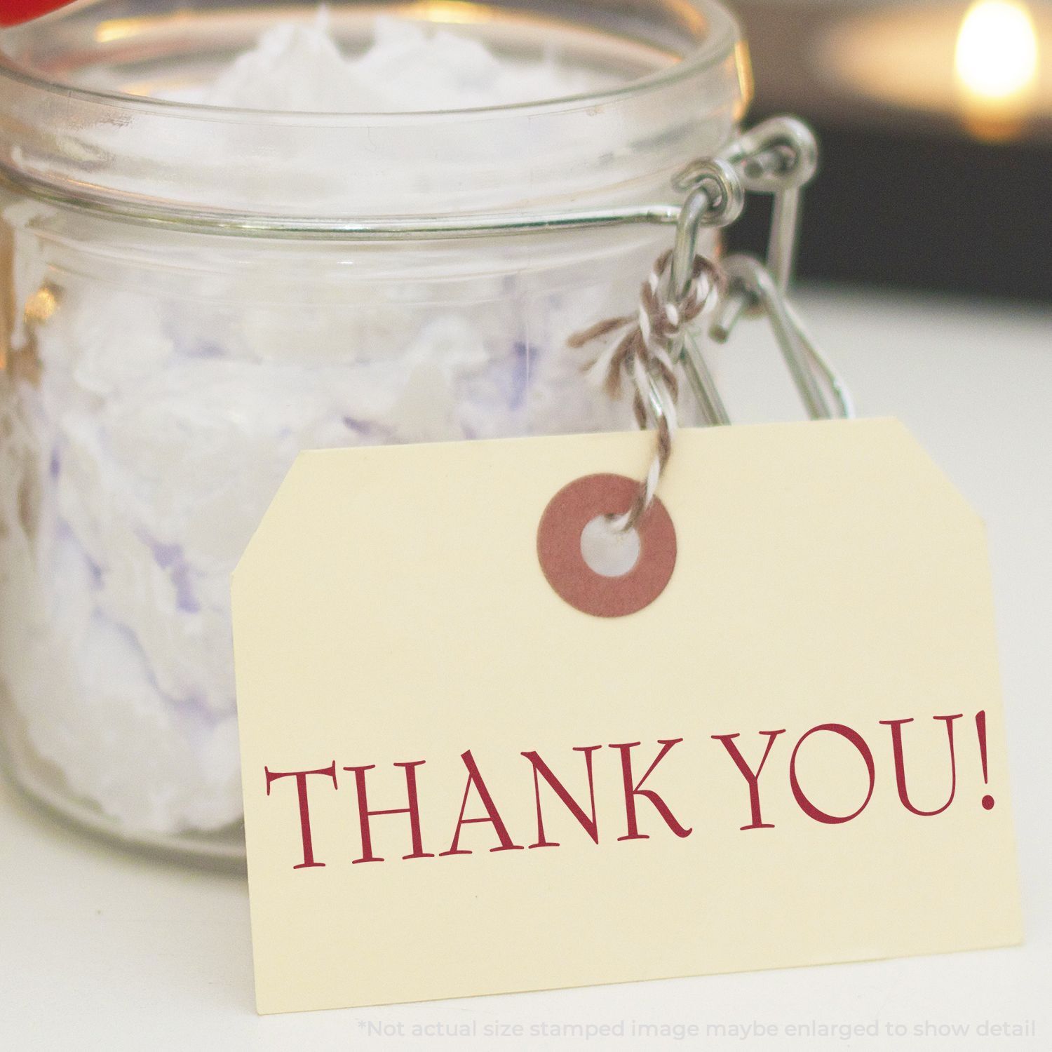 Glass jar with Thank You gift tag, elegant wedding favor or party favor packaging.