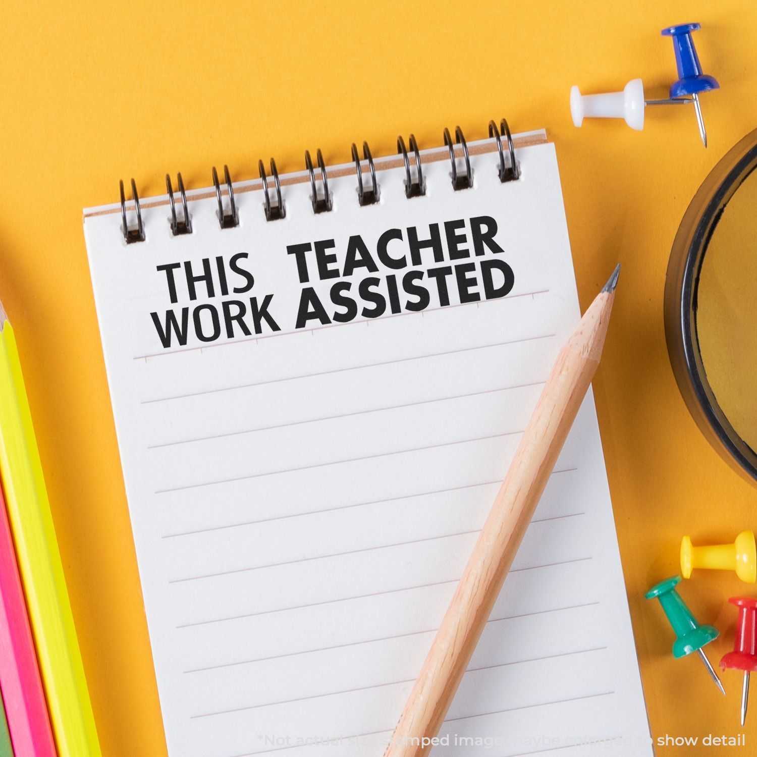 Notebook page reads This Teacher Works Assisted with pencil, pins and staplerschool support message for teachers.