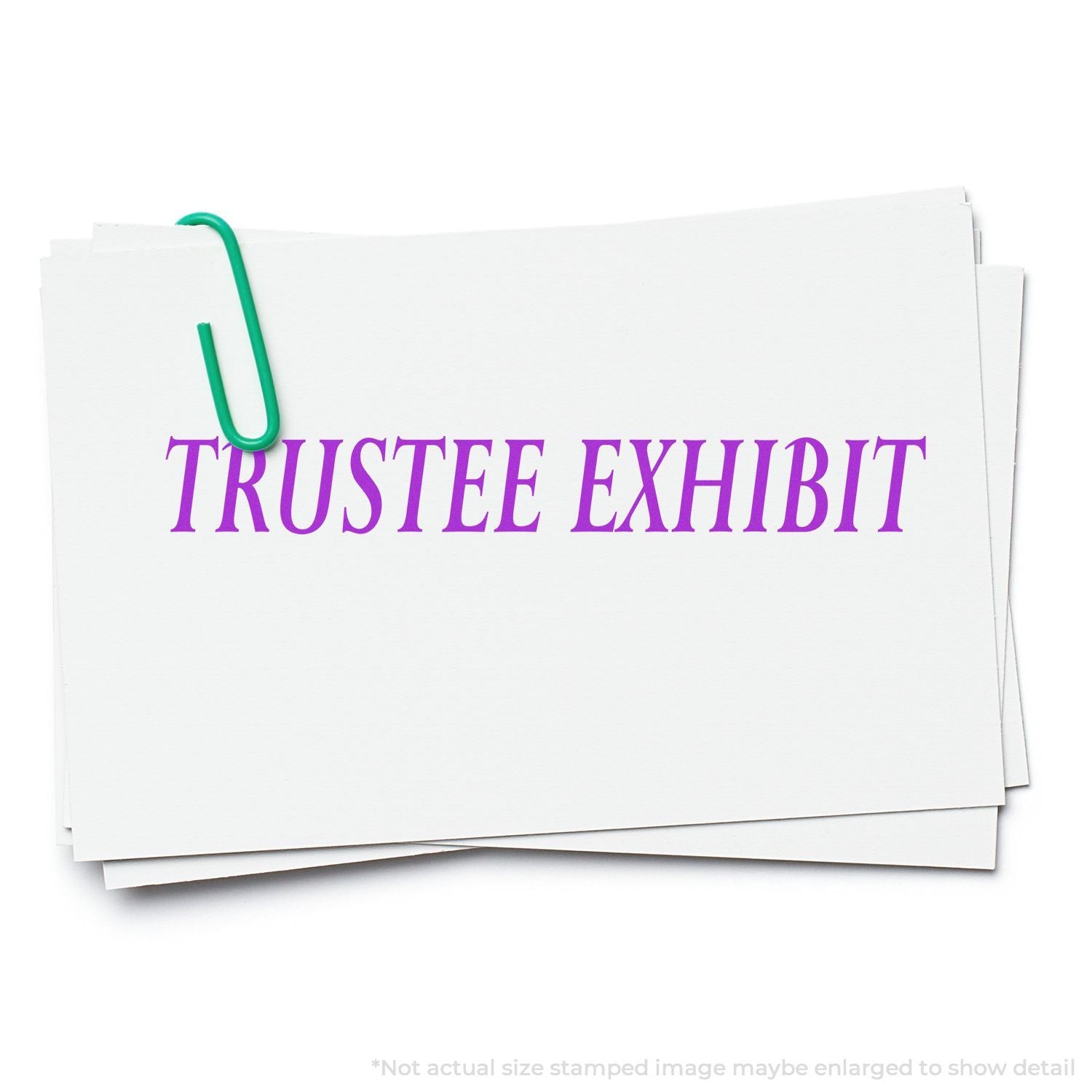 Stack of trustee exhibit documents clipped with a green paperclip on a white background.