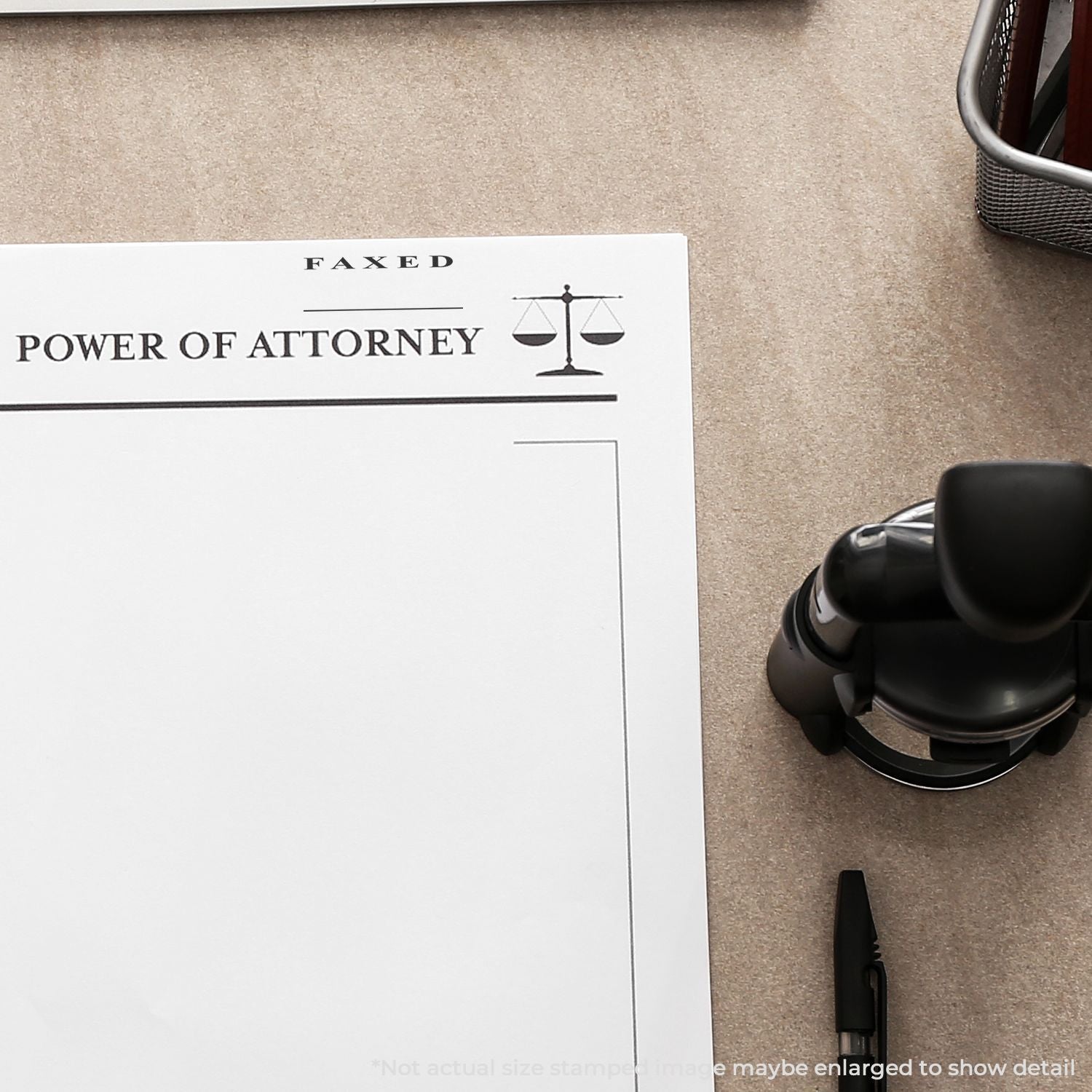 Faxed power of attorney legal document on an office desk with a notary stamp and pen.