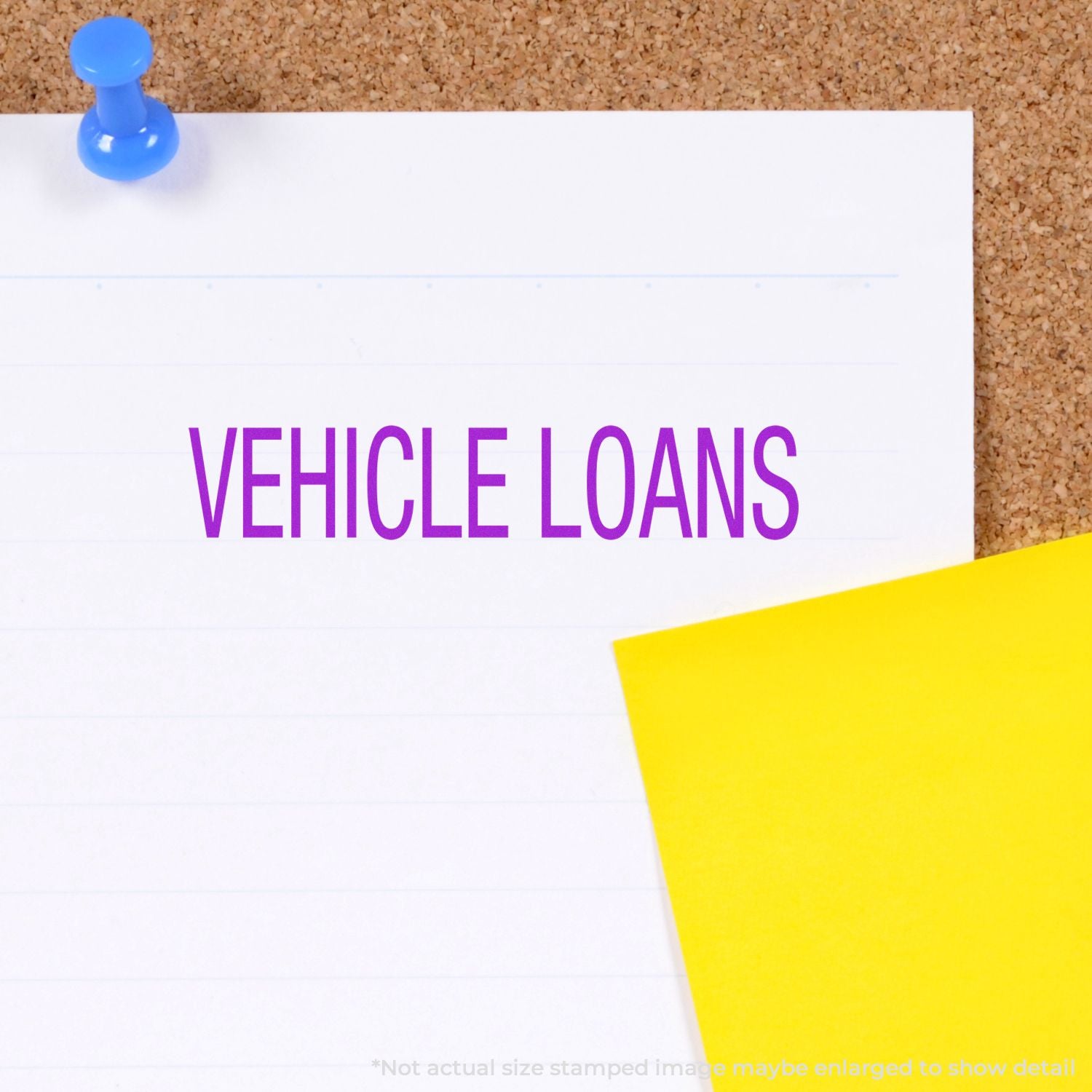 Vehicle loans concept on pinned paper note with pushpin on corkboard, finance and auto lending theme.
