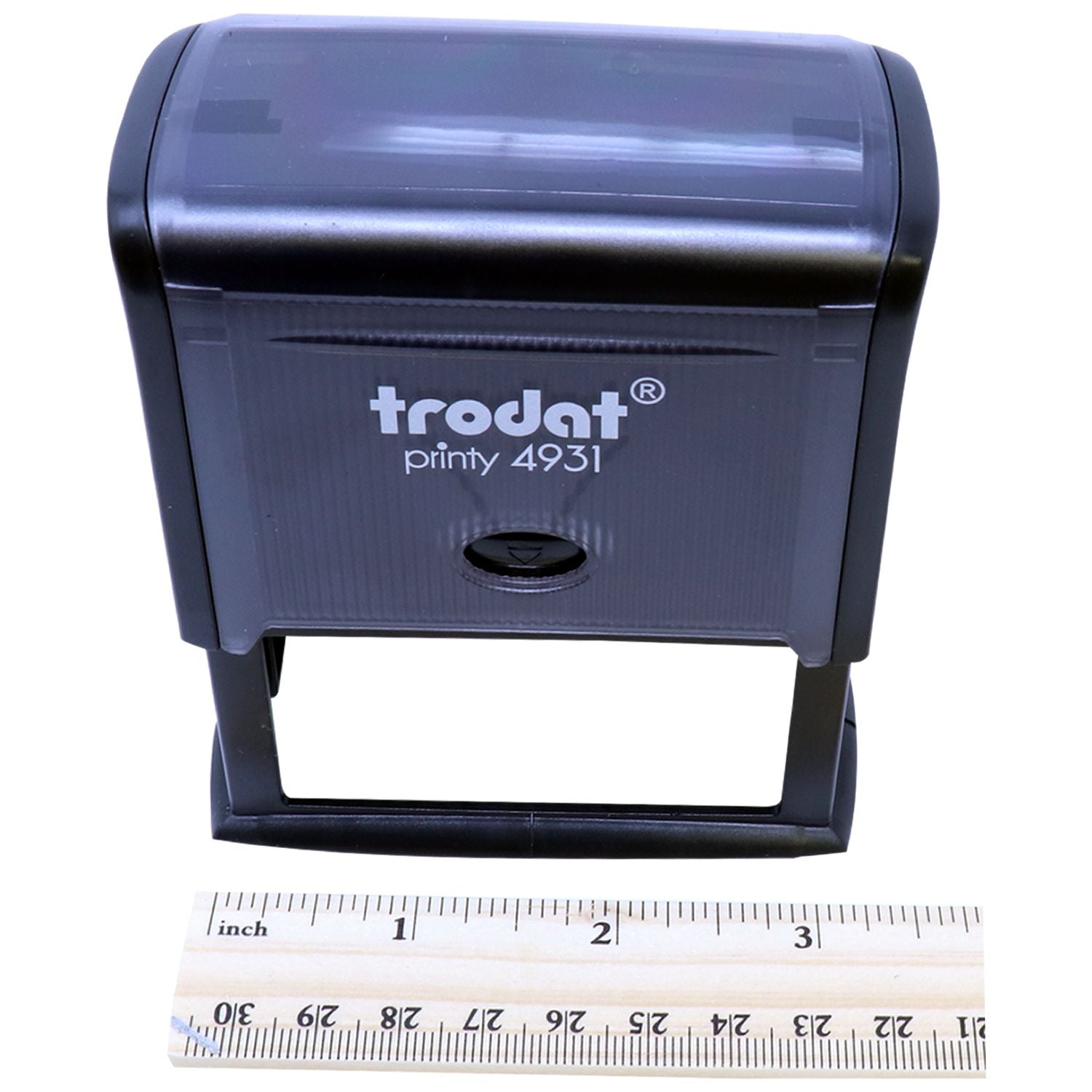Trodat Printy 4931 self-inking rubber stamp with ruler for size reference on white background