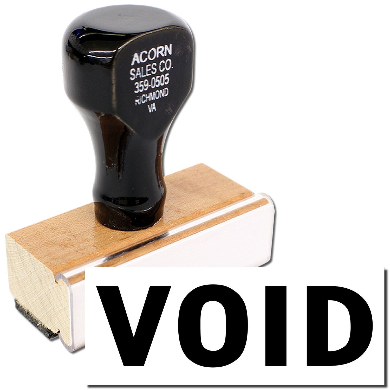 Black VOID rubber stamp on wooden handle, self-inking office stamp for document marking and cancellation.