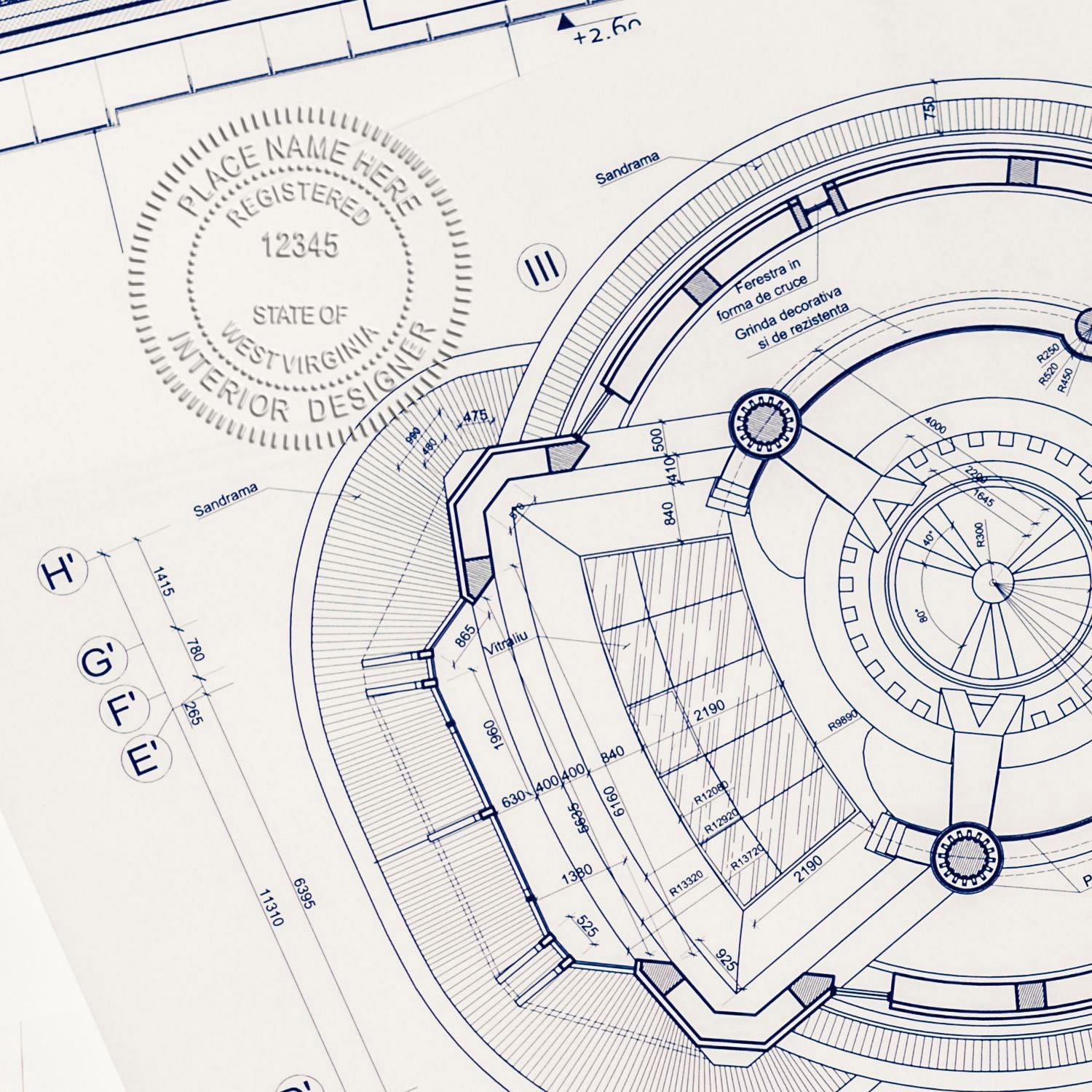 Architectural blueprint floor plan with circular design, technical measurements, and West Virginia interior designer watermark seal.