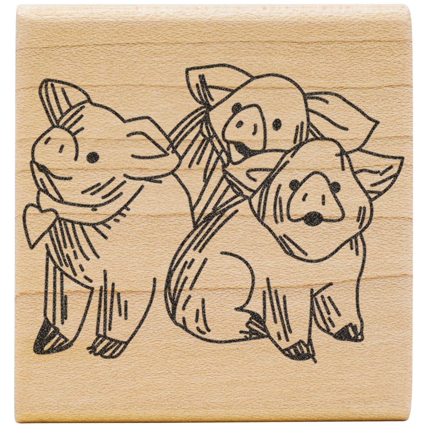 Three cute hand-drawn bear illustrations on a wooden stamp block