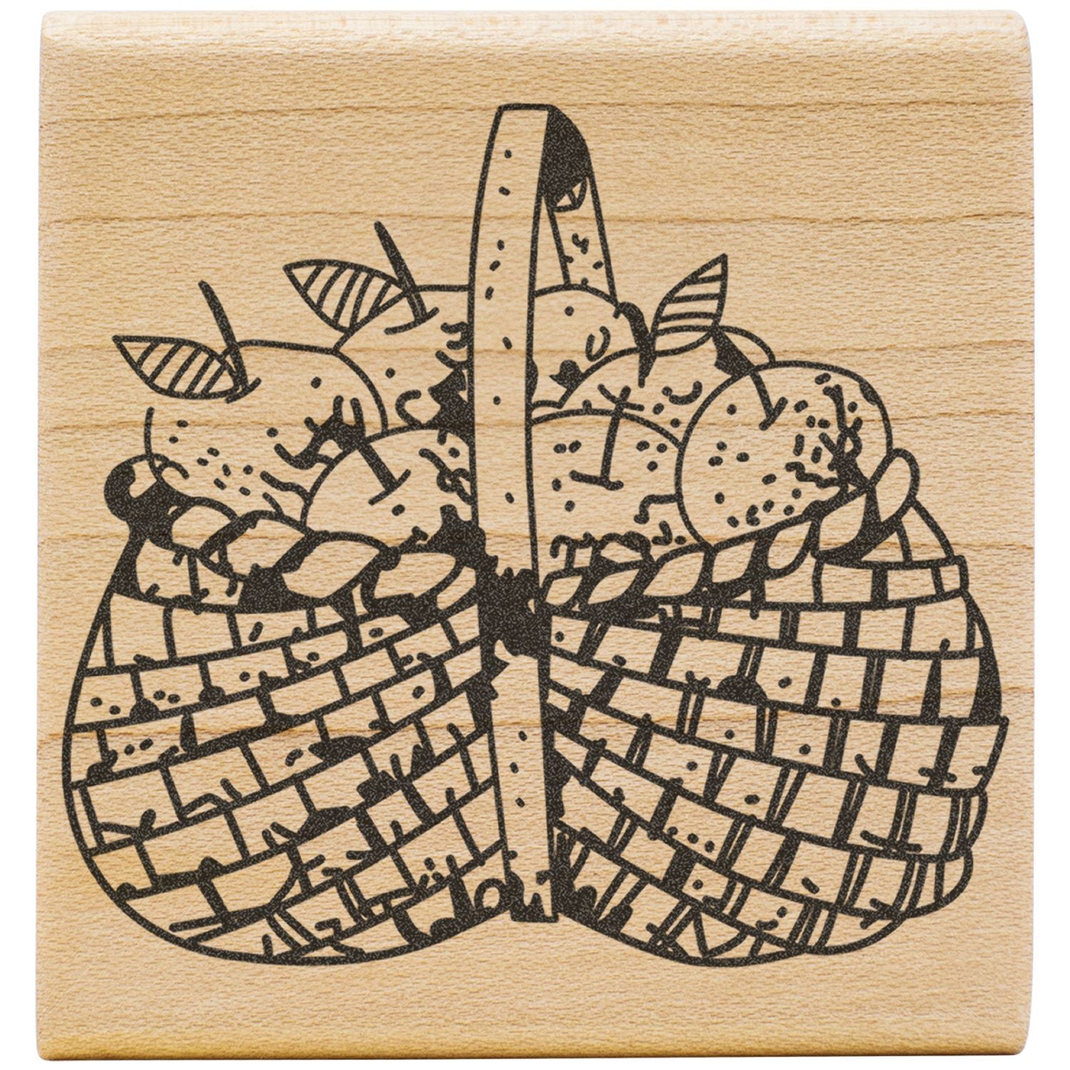 Wooden rubber stamp with rustic black line art of a basket filled with apples and leaves