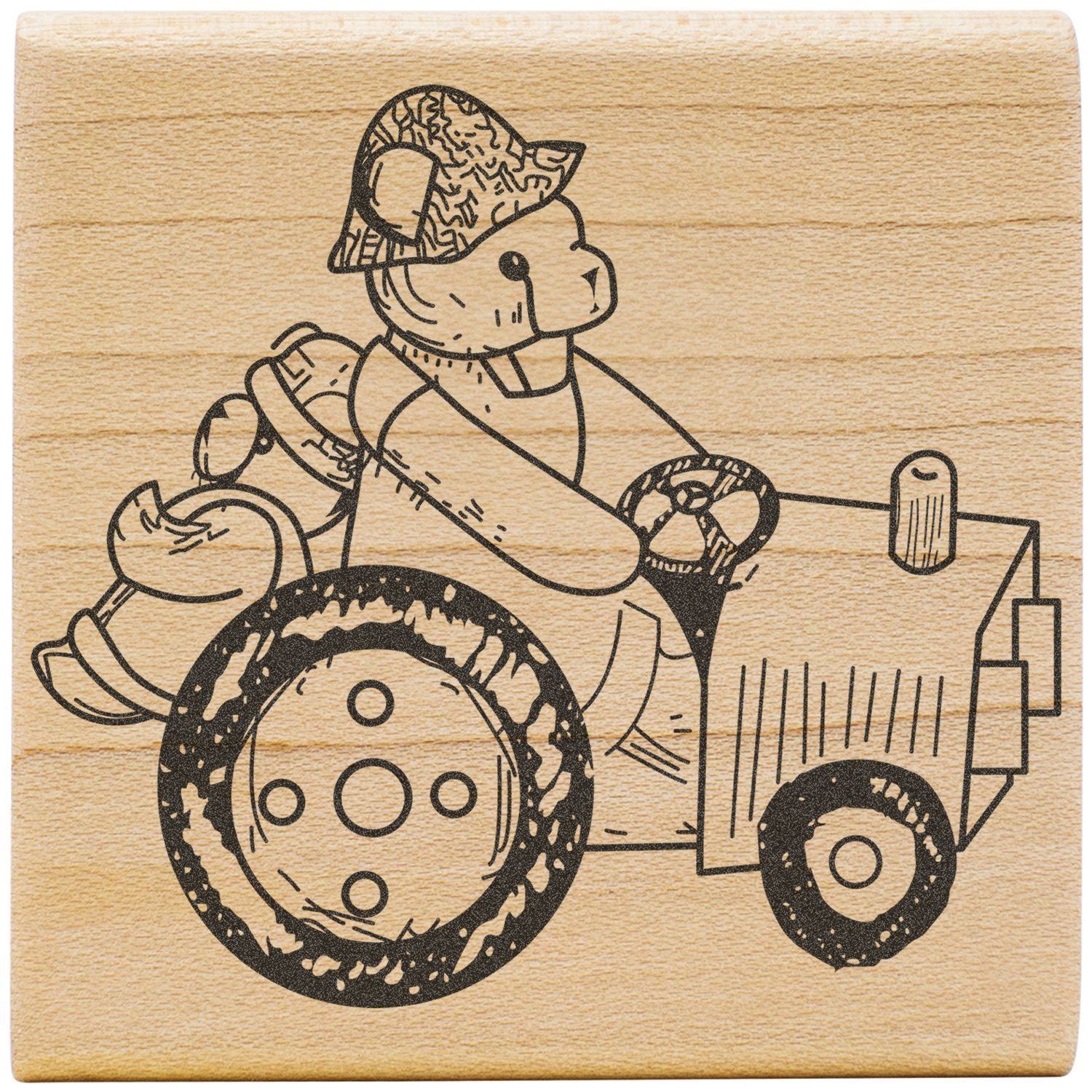 Wood-burned dog driving a tractor illustration on a wooden block, rustic farm-themed decor.
