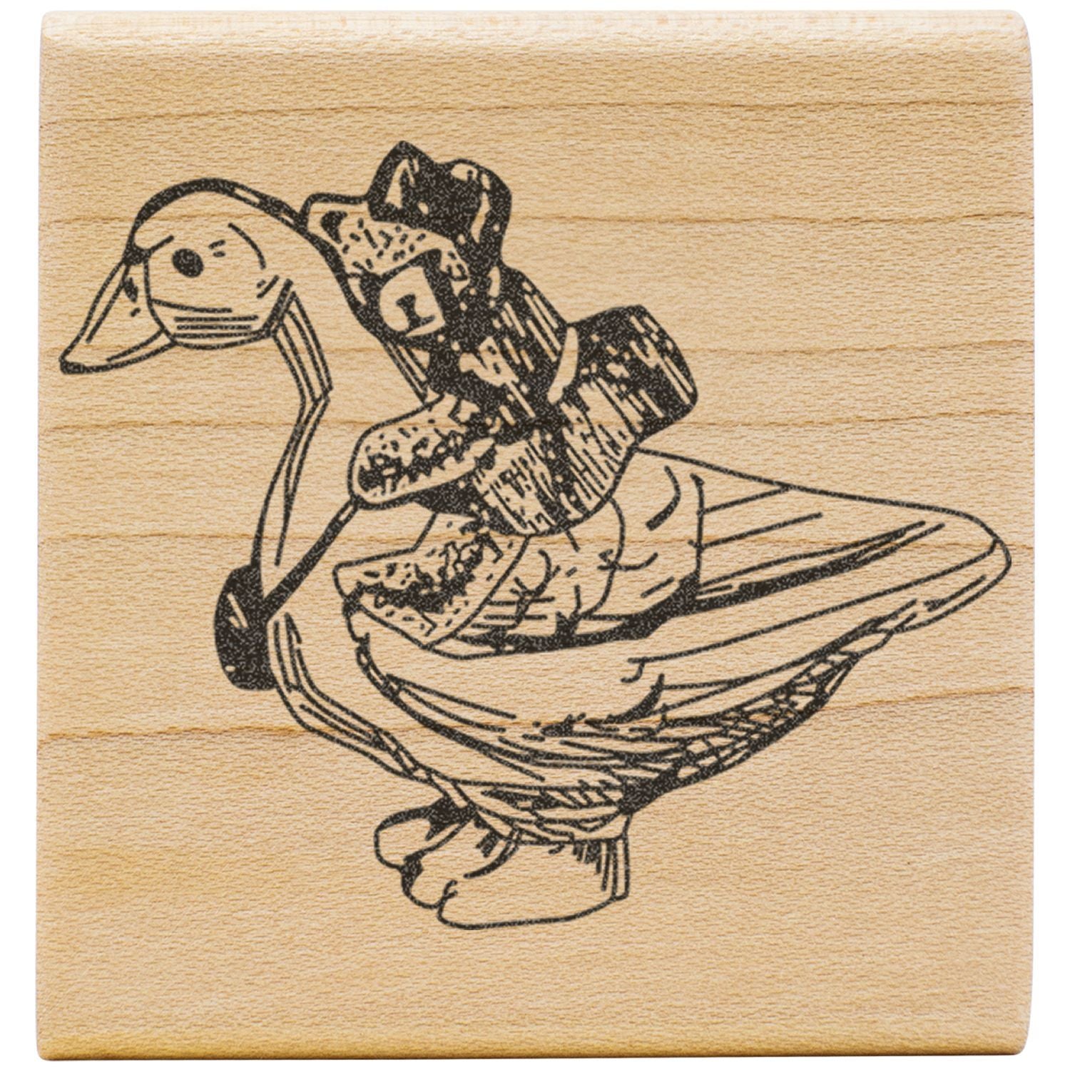 Wooden rubber stamp with vintage duck illustration on natural wood block.
