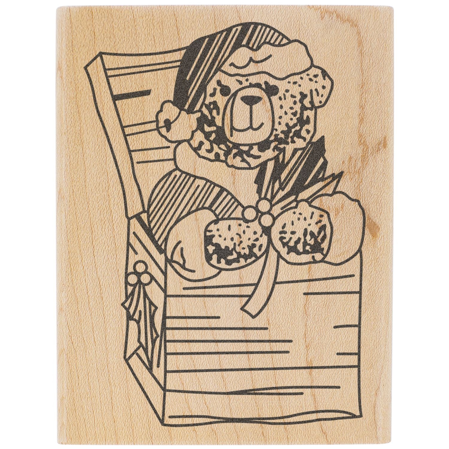 Cute wooden stamp illustration of a teddy bear wearing a Santa hat and scarf in a crate, festive holiday design