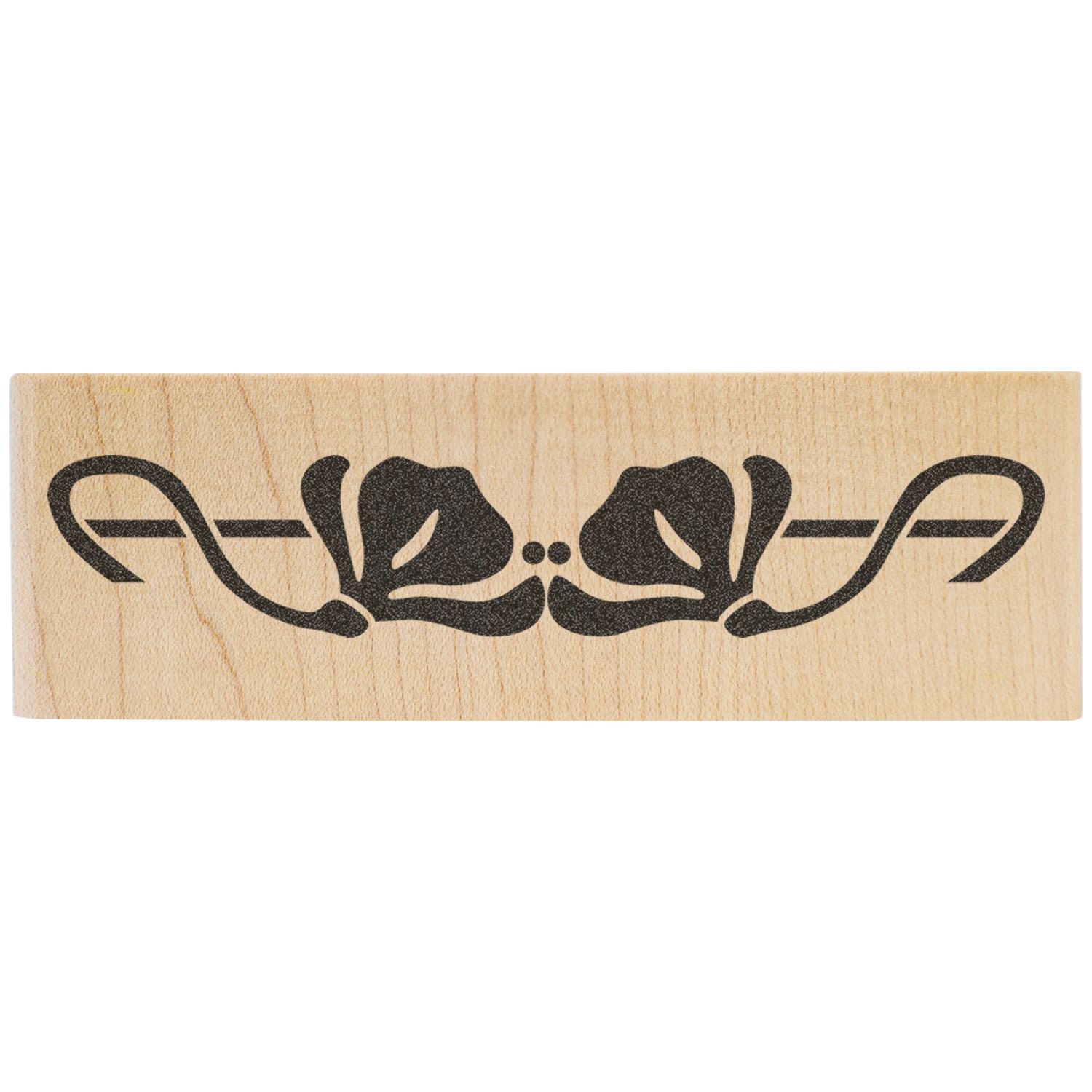 Wooden rubber stamp with black ornamental symmetrical design on a light wood block