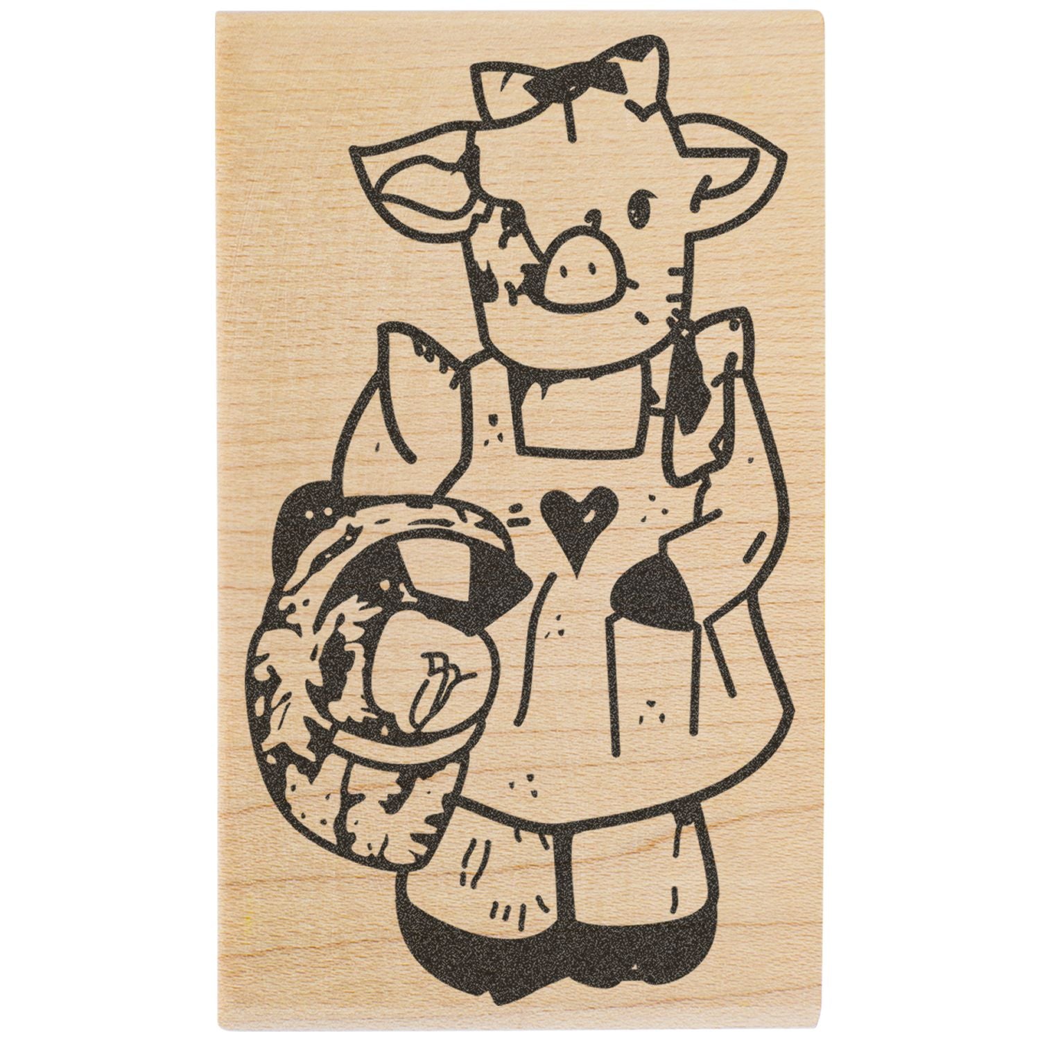 Cute cow illustration engraved on a wooden block with black ink detail and heart design