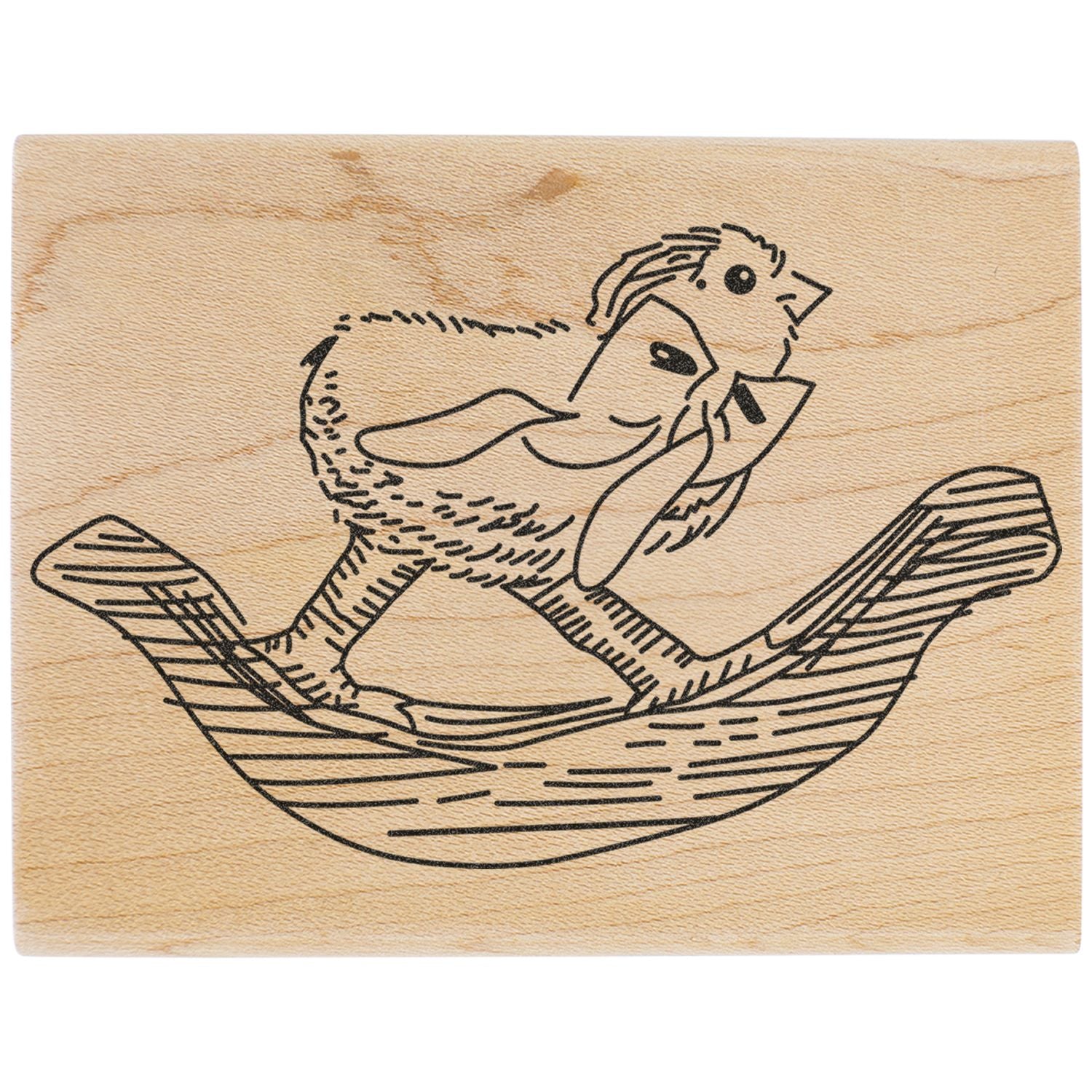 Wooden rubber stamp with duck in a boat illustration, vintage hand-drawn animal design on natural wood block.