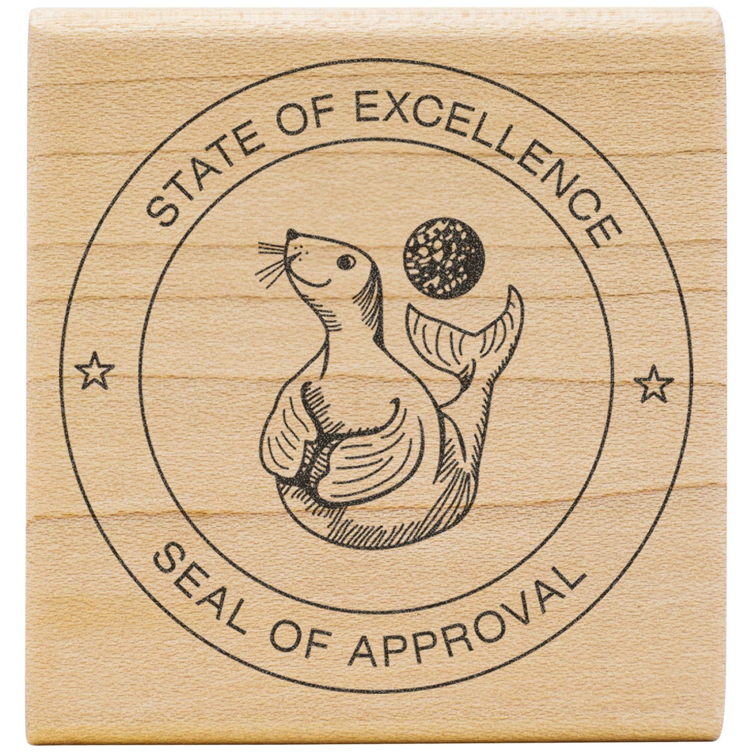Wooden stamp with State of Excellence seal of approval featuring a cute seal illustration on a square block.