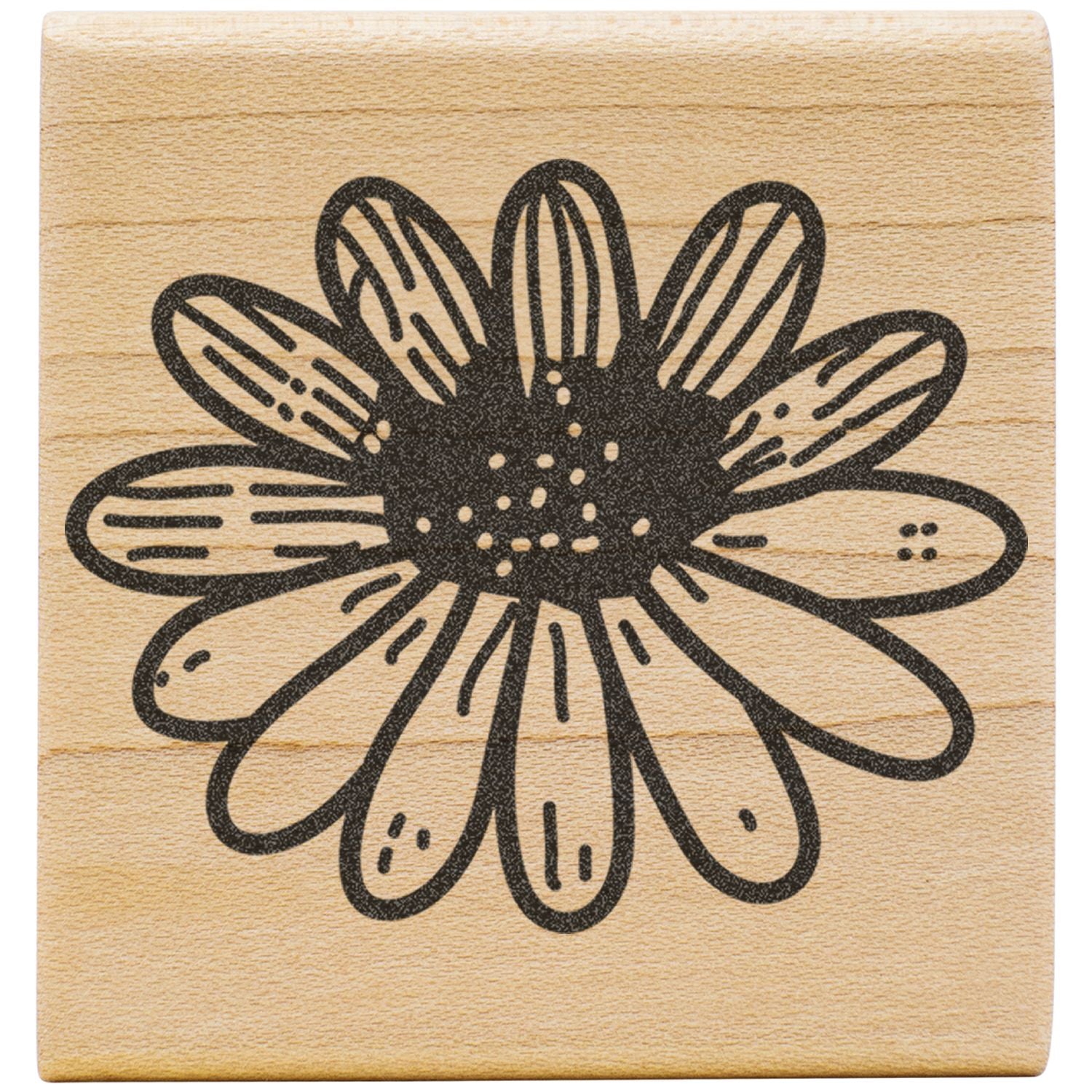 Floral flower stamp design on a wooden block with black outline on natural wood background