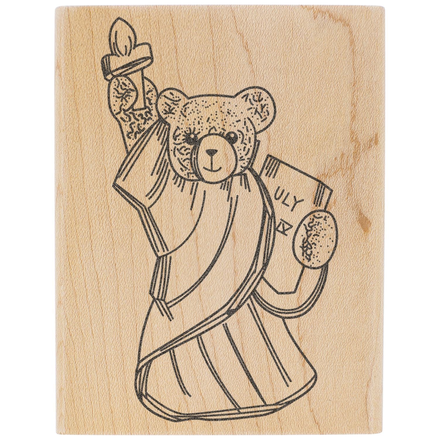 Handmade wood-burned teddy bear illustration in a dress holding a candle, rustic engraved art on wood panel.