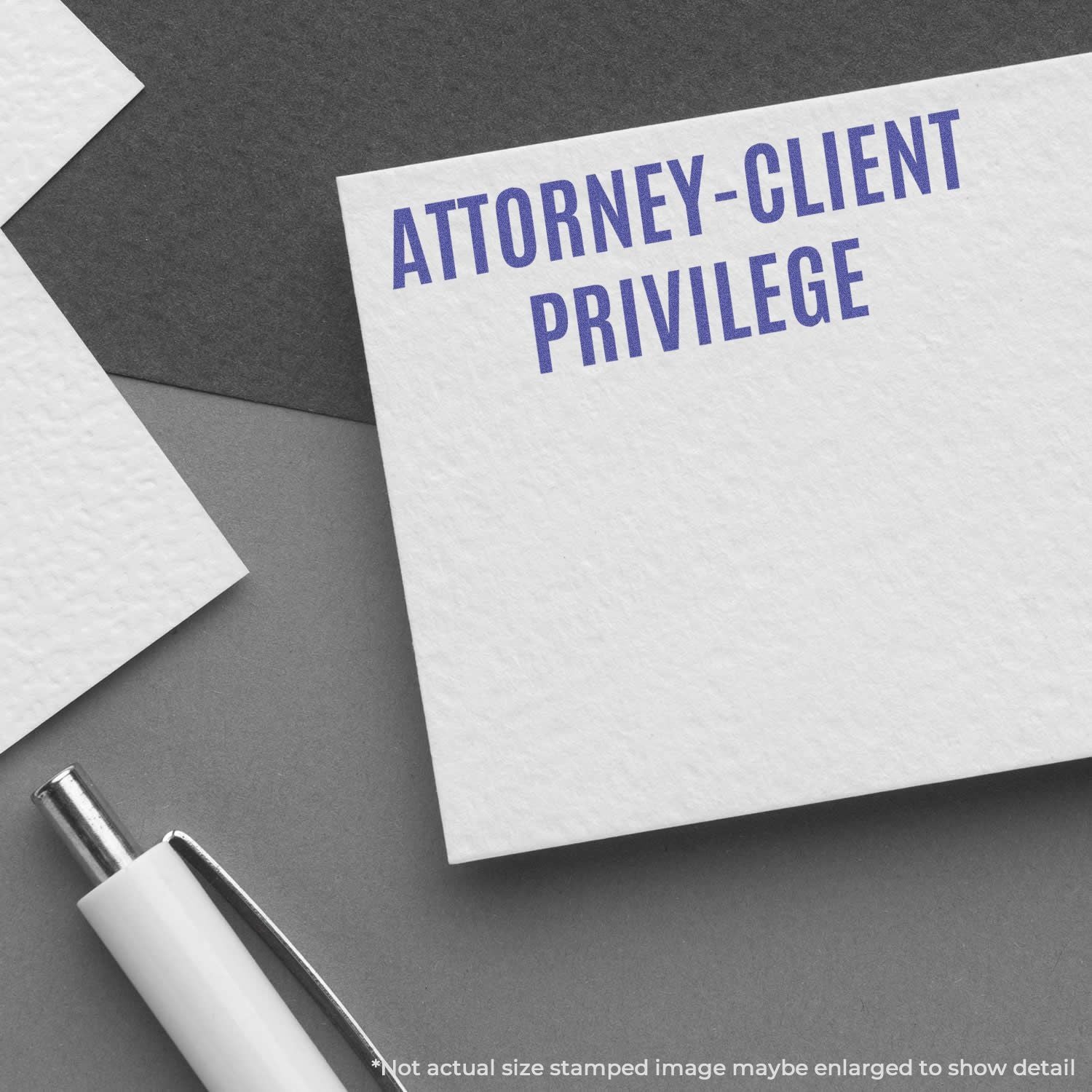 Attorney-client privilege stamped document with pen on desk, legal confidentiality concept for law firms and lawyers.