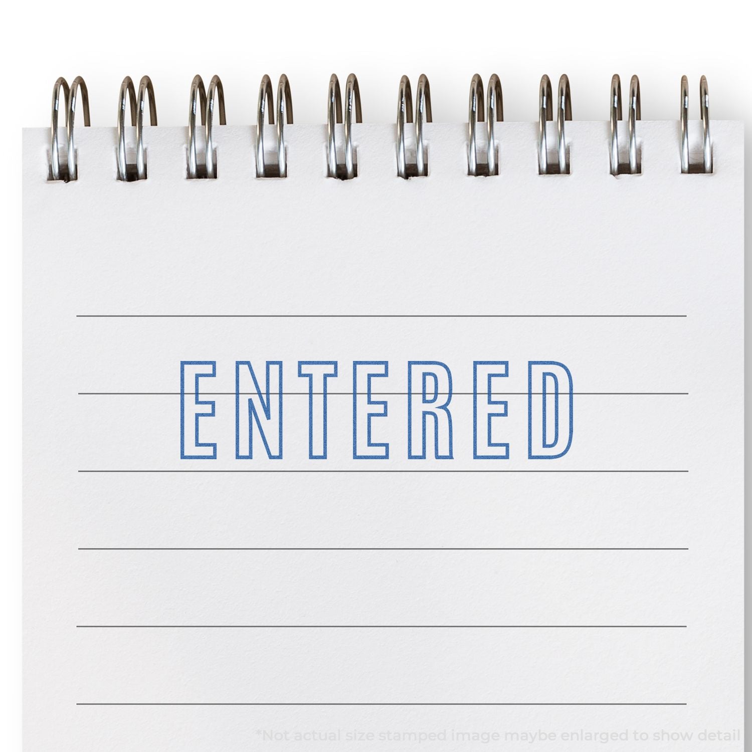 Stainless metal staples holding a white document stamped ENTERED, representing record filing and document processing.