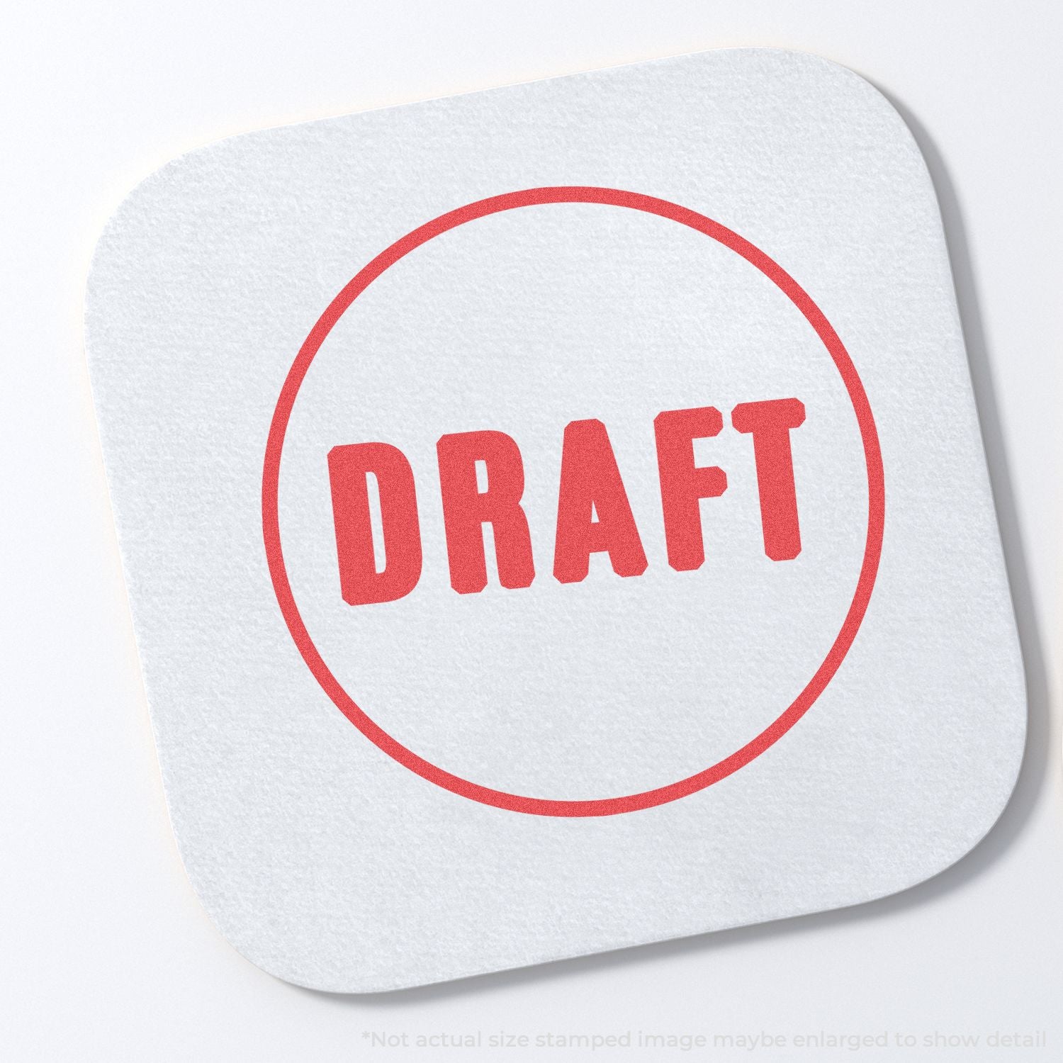 DRAFT stamp on white paper with red circular seal, marking documents for review, version control, and pre-publication workflows.
